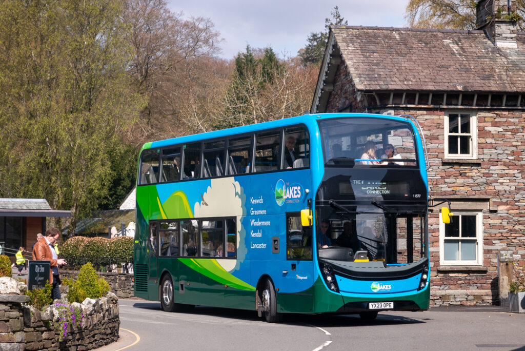 An image of the low emission Stagecoach Bus travelling through a Lake District Town